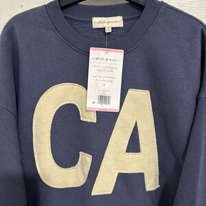 Brand new with the tags Blue Loose Sweater for Women size S